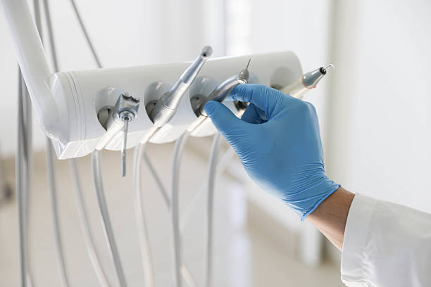 Professional Tooth Extraction technician working in Muldrow, OK